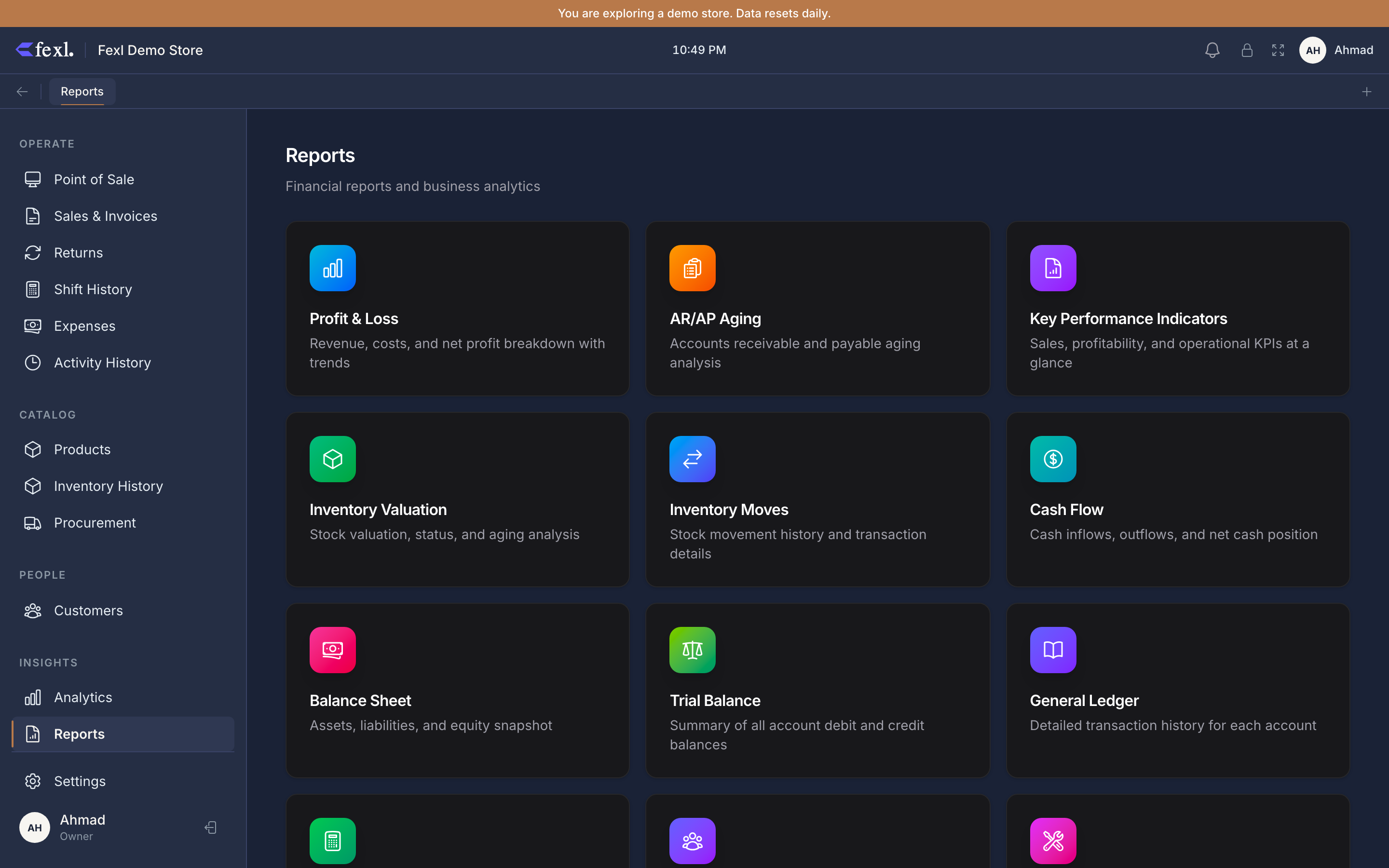 Reports landing hub — 12 reports in a 3-column card grid: Profit & Loss, AR/AP Aging, KPIs, Inventory Valuation, Inventory Moves, Cash Flow, Balance Sheet, Trial Balance, General Ledger, and more